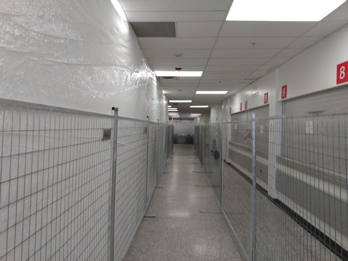 Temporary crowd control fencing installation at outdoor public event in Toronto